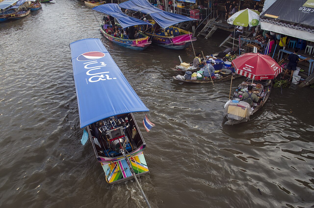 Canal-side food stalls at Amphawa